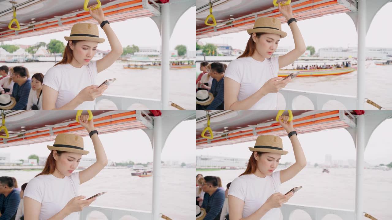 女孩乘船过河游览泰国受欢迎的旅游目的地。
