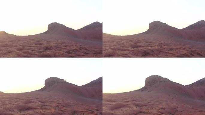 4k无人机镜头，带沙波纹的梅利哈沙漠化石岩石高原的鸟瞰图，阿拉伯联合酋长国沙丘沙漠狮身人面像的地质景