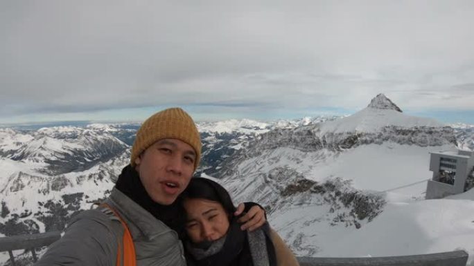 年轻浪漫的情侣一起在瑞士冰川3000旅行