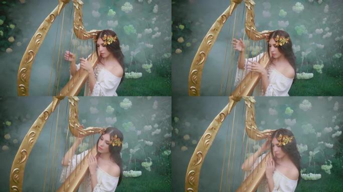 温柔的女孩可爱的天使般的脸在竖琴上演奏精灵歌曲旋律。希腊女神