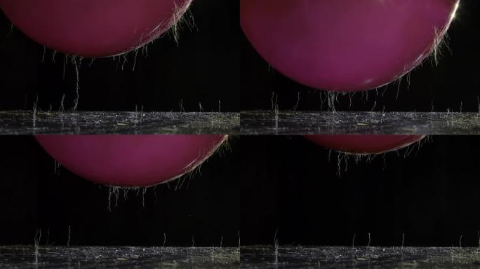 气球中的静电从台面上拾取头发和灰尘 | 科学实验