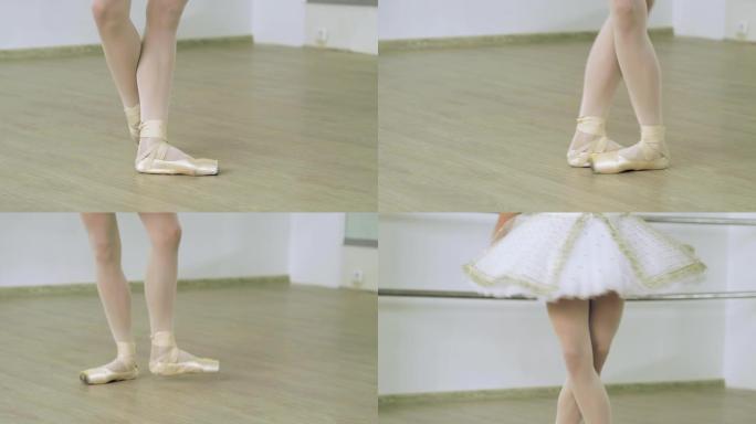 芭蕾舞演员的脚在舞蹈工作室的足尖鞋中跳舞的特写镜头。4K