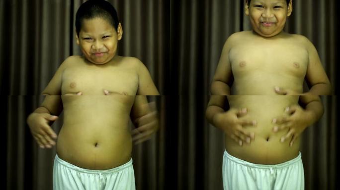 亚洲男孩吃得太多，以至于他们很胖。