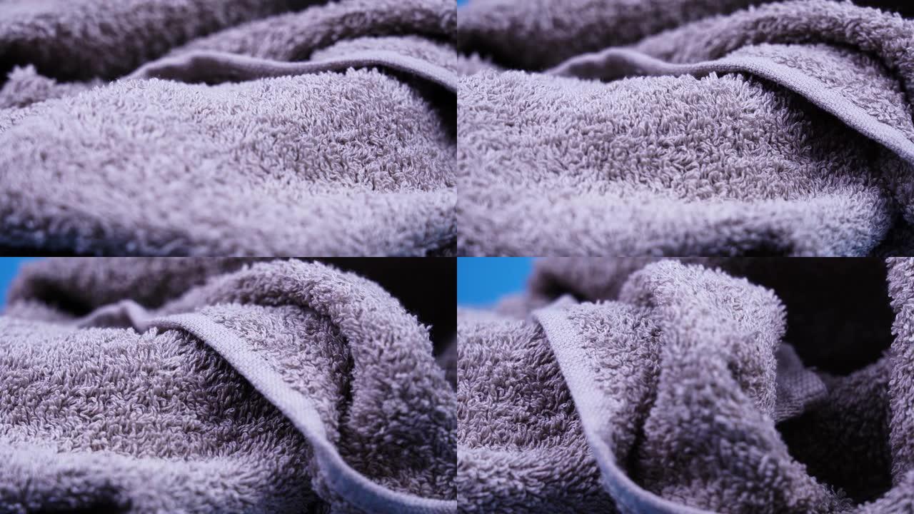 紫色柔软的毛巾布躺在旋转特写