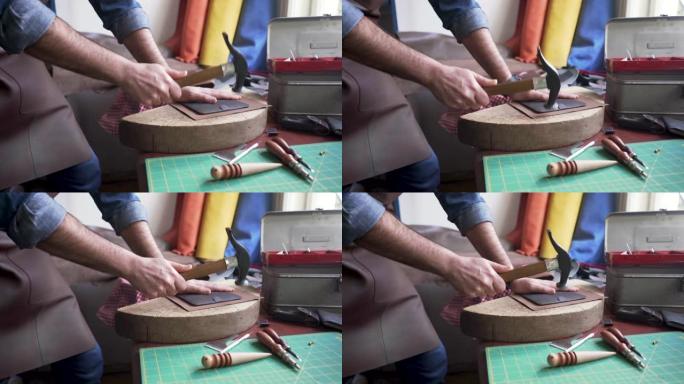 用锤子工作手工艺人手工皮鞋做皮鞋