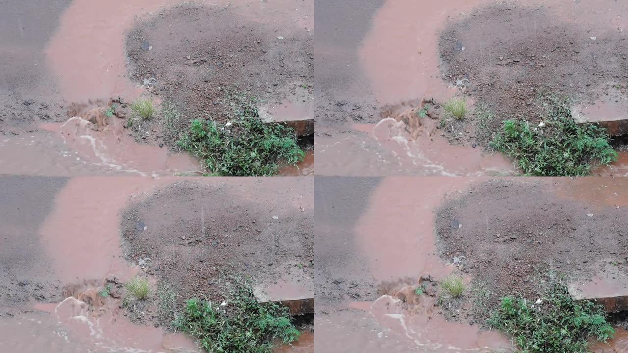 大雨导致污水流经路面的特写视图