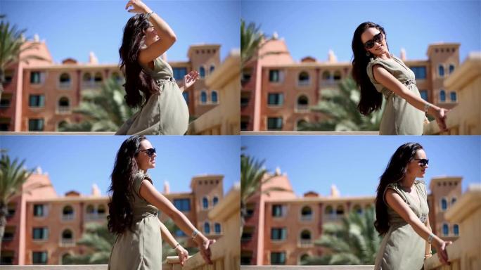 美丽的黑发女人在镜头前摆姿势