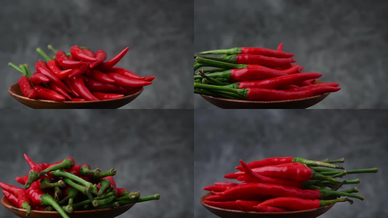 红辣椒，旋转盘子上有辣味的蔬菜辛辣调味料