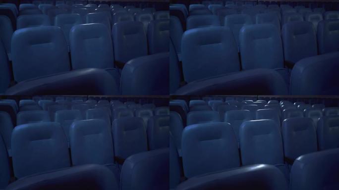 空电影院。没有观众的电影首映。电影院，聚光灯
