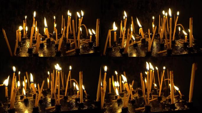 东正教和天主教教堂里，蜡烛在祭坛上燃烧。