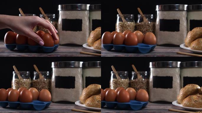 用面包，面粉和燕麦片从桌子上拿一个鸡蛋