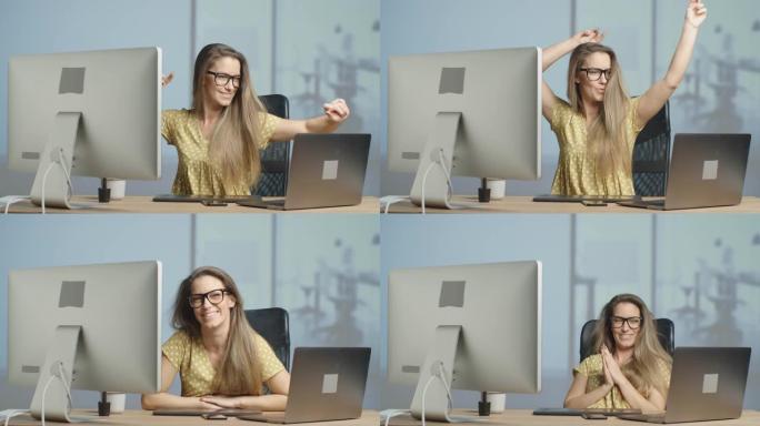 漂亮的女性平面设计师在她的广告代理办公室完成了一天的工作。在工作中跳舞。慢动作4k