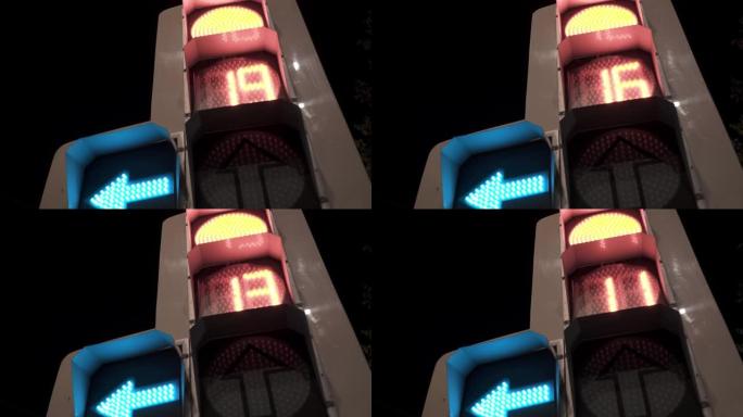 红灯和绿色箭头在左边的交通灯