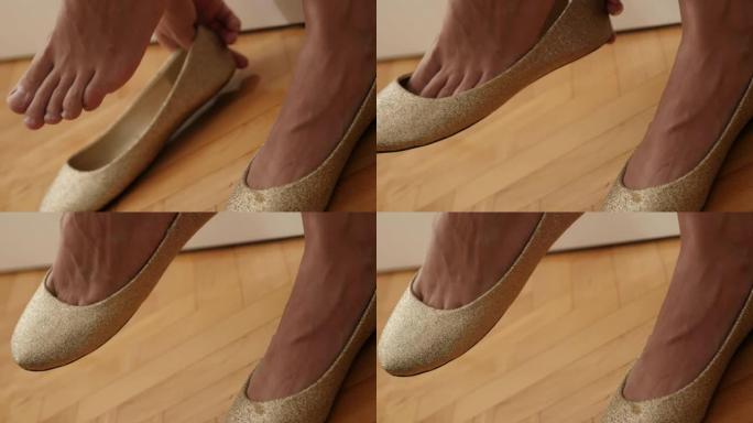 女性腿部金色芭蕾平底鞋4K