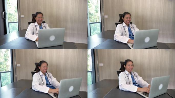 场景慢动作年轻女性亚洲医生微笑在办公室工作，健康理念