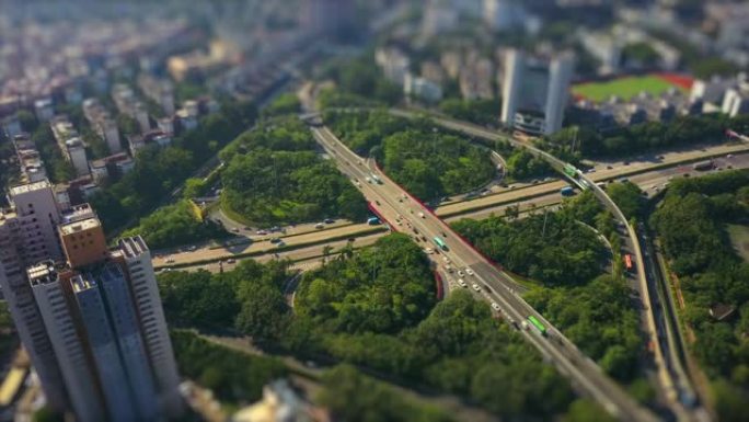 日间深圳市著名交通路口空中全景4k倾斜移位中国
