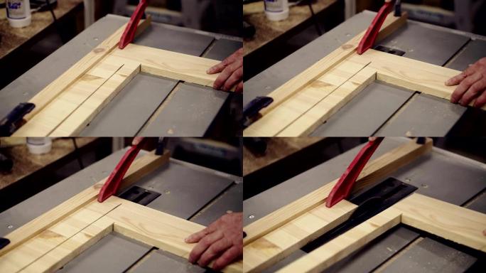 锯床上切割木板的高角度镜头。行动。工业机器用圆锯切割木板。男性手握图案