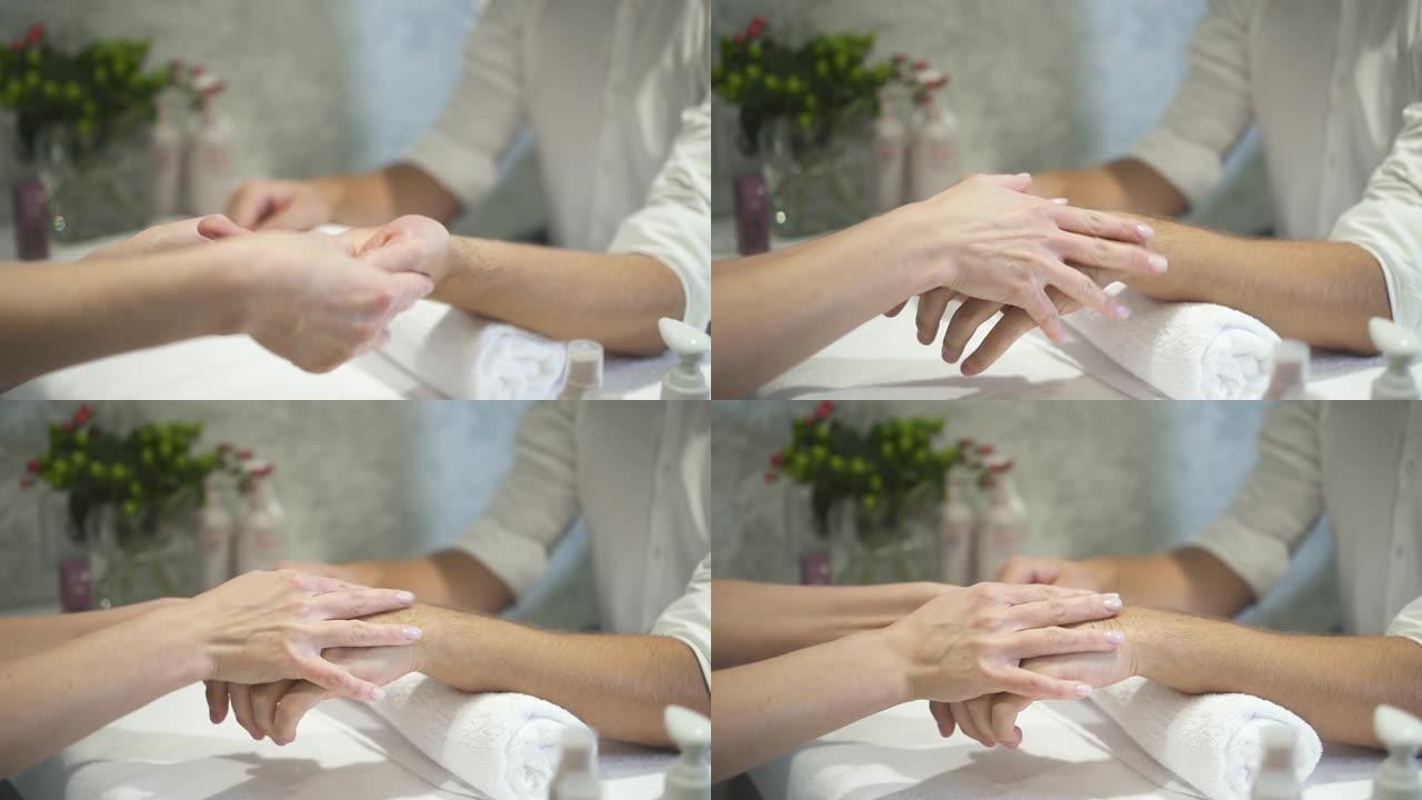 女医学大师正在使用触摸动态压力进行保健治疗