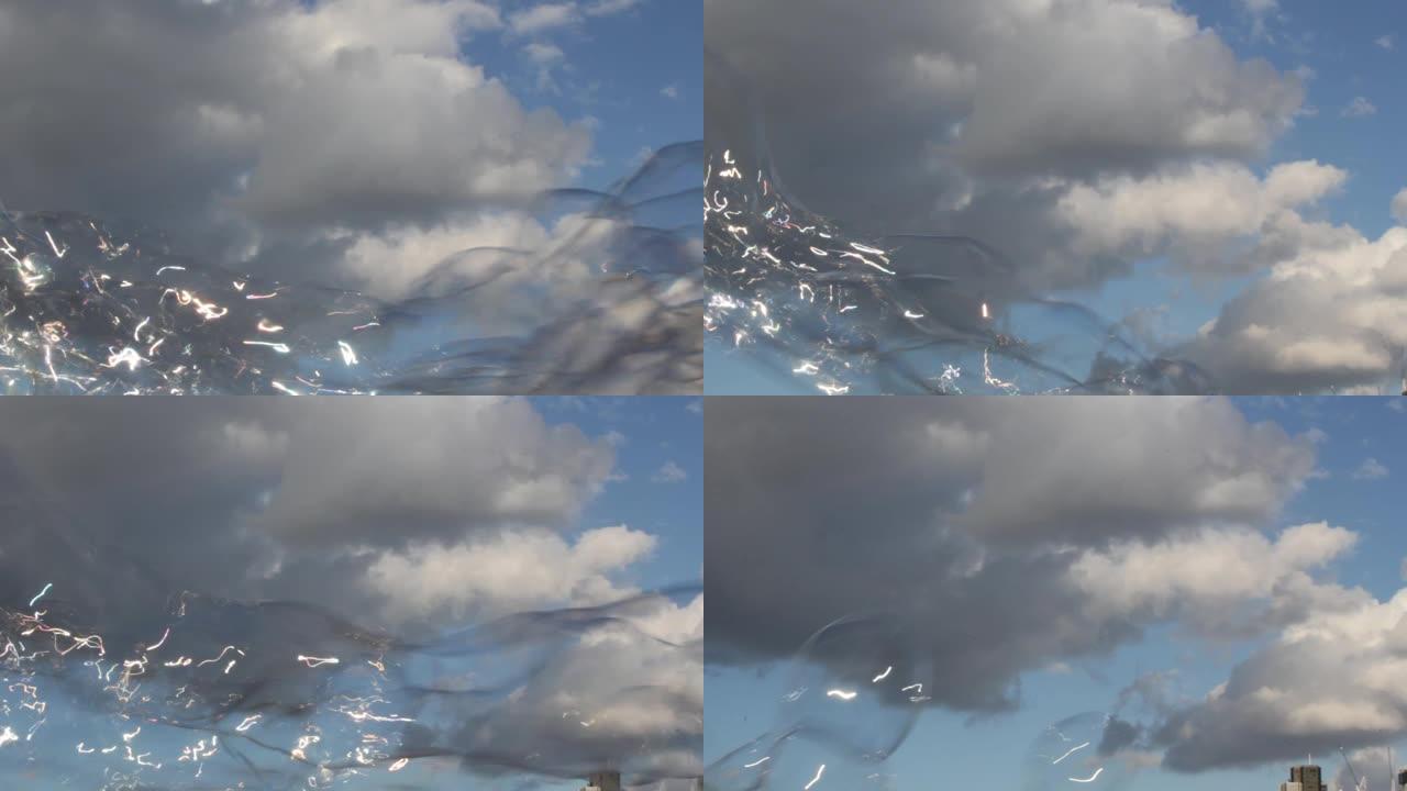 泡泡漂浮背景肥皂副本泡泡漂浮肥皂在蓝天下漂移与云彩股票，照片，照片，图片，图像空间-股票素材视频