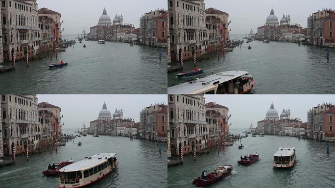 学院桥附近的大运河上的威尼斯，吊船和其他船只