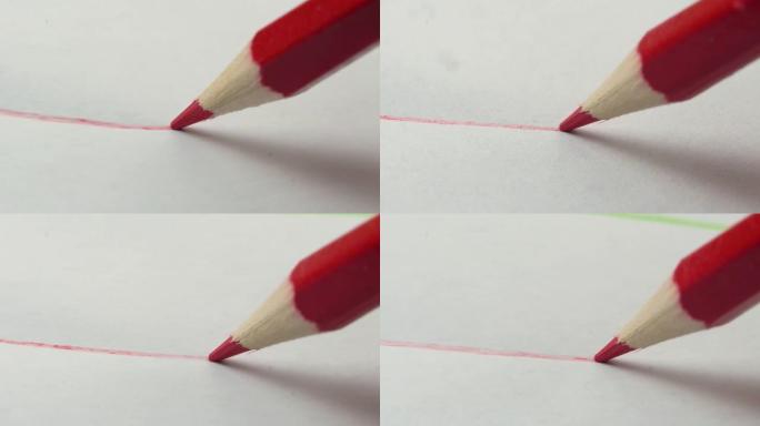 白纸背景上的红色铅笔直线，微距摄影