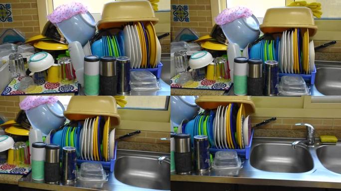 一群晾晒的盘子堆得很高。家务、任务、工作、清洁的概念。