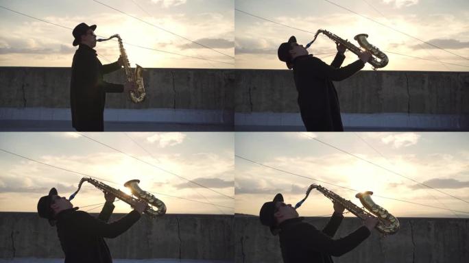 萨克斯演奏家在日落时在屋顶演奏萨克斯管时充满兴奋和宁静