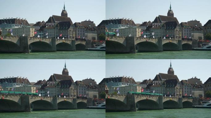 巴塞尔市中心晴天河拥挤游泳区交通大桥湾全景4k瑞士