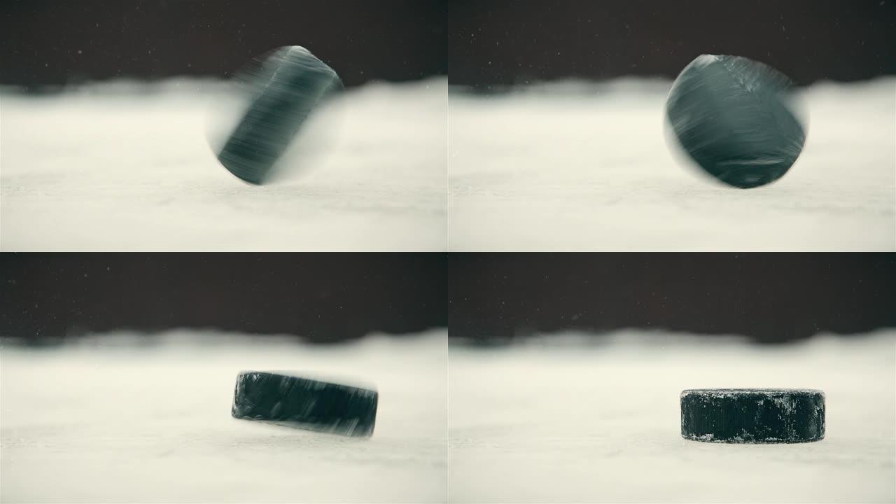 黑色冰球在溜冰场上的快速特写旋转