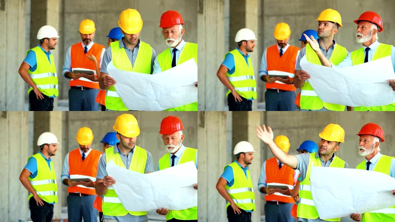 建筑工程师和承包商监督建筑过程
