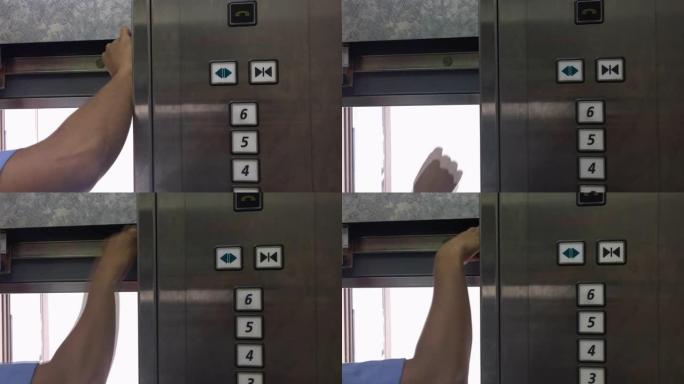电梯机械师修理电梯竖井中的电梯