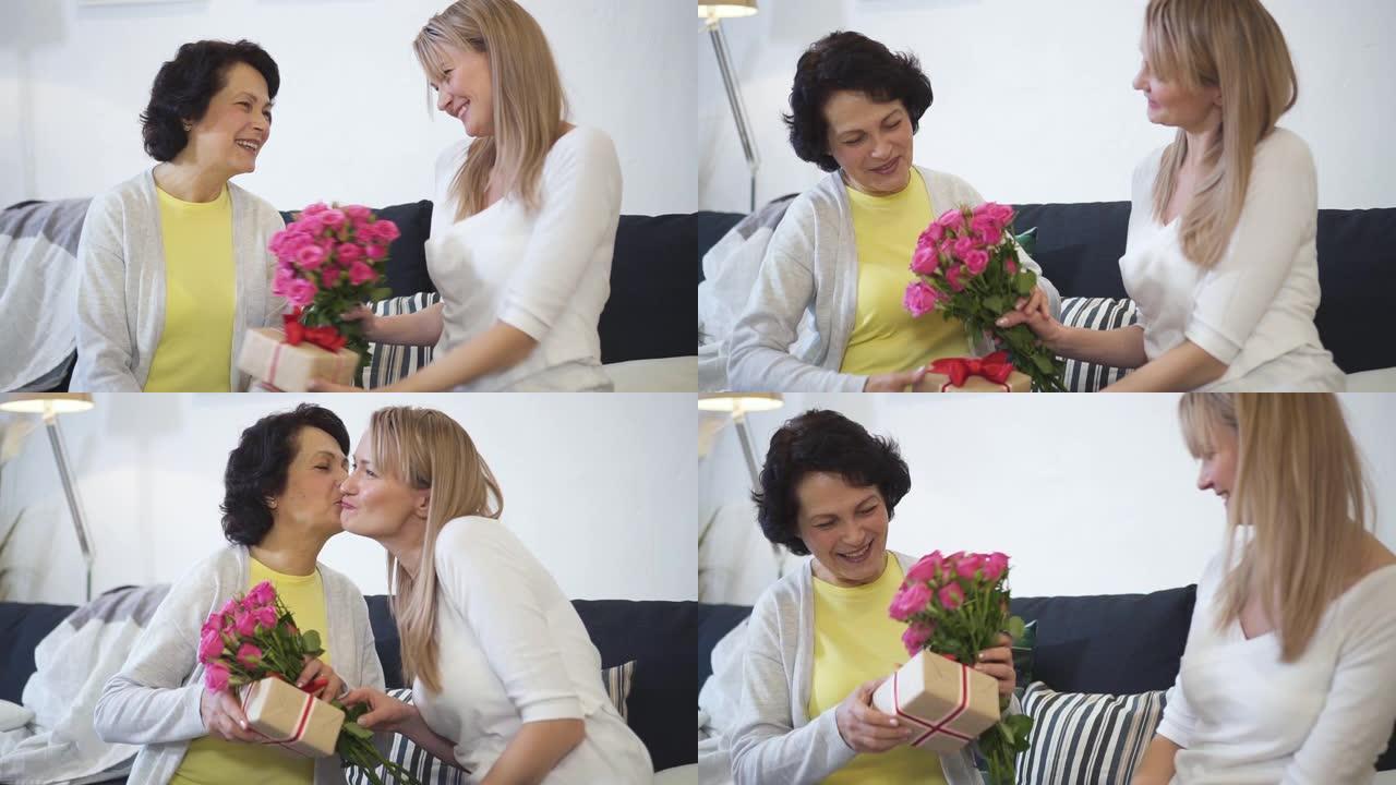 年轻迷人的女儿正在拜访年迈的母亲，交谈并赠送美丽的粉红玫瑰