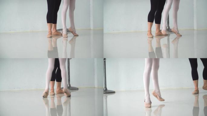 以下是低角度视图: 教芭蕾舞女演员的老师的脚