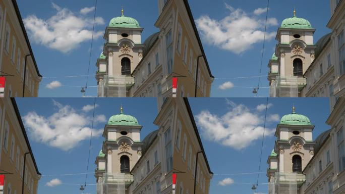 萨尔茨堡市中心白天时间著名的教堂建筑顶部4k奥地利全景图