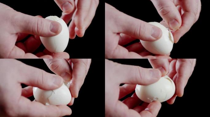 男人的手从蛋壳上清洗煮鸡蛋。