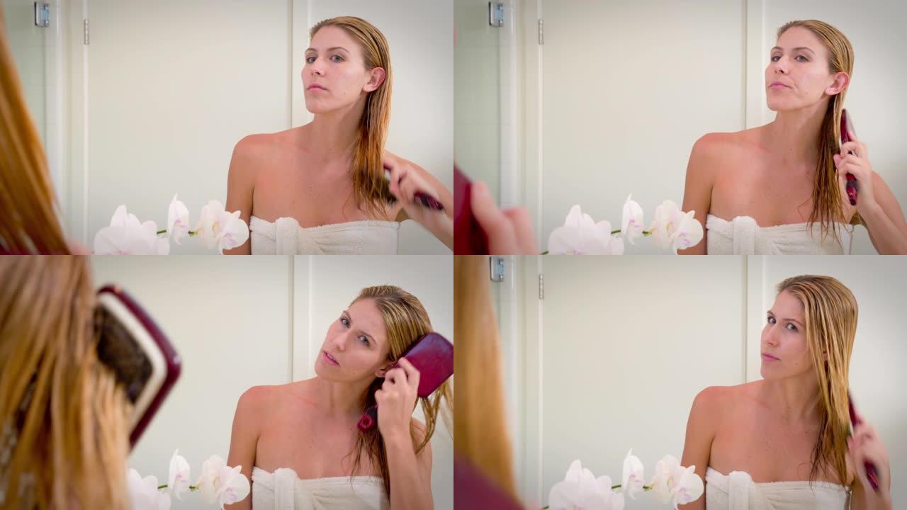 女人洗完澡后刷牙女人洗完澡后刷牙梳头发外