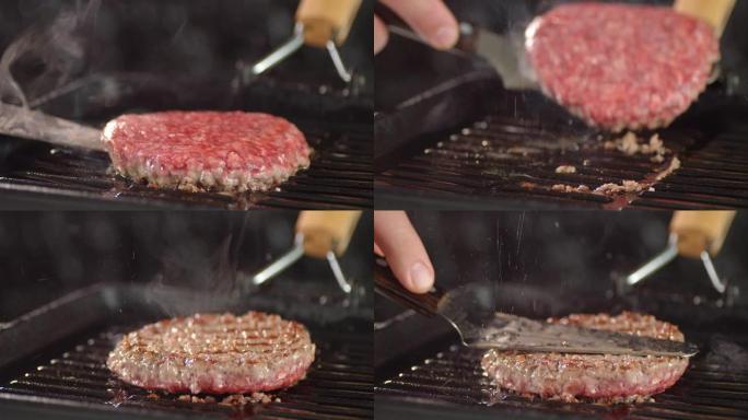 刮刀在热锅上翻过生汉堡。