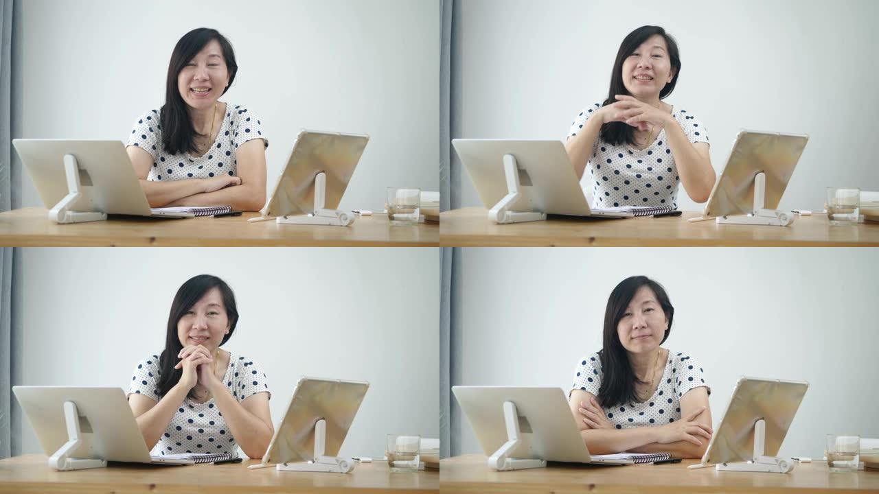 快乐的亚洲女性在新型冠状病毒肺炎期间在家工作时做视频会议。