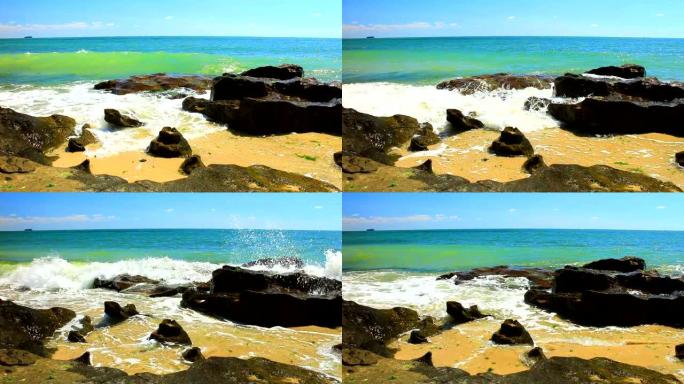 海滩上岩石和海浪的美丽景色