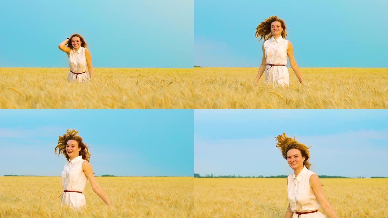 幸福的红头发女孩在金色麦田里奔跑