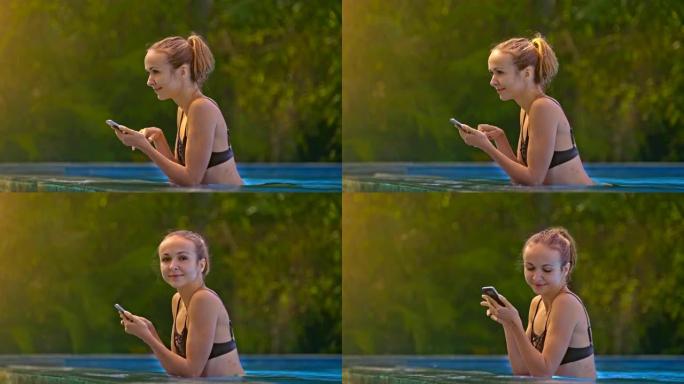 女孩看着智能手机，并在水潭侧视图中休息
