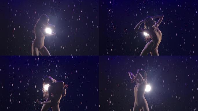 一位当代现代舞蹈芭蕾舞演员正在雨中性感地跳舞，享受这一刻。雨滴在蓝色背景上闪闪发光。慢动作。特写