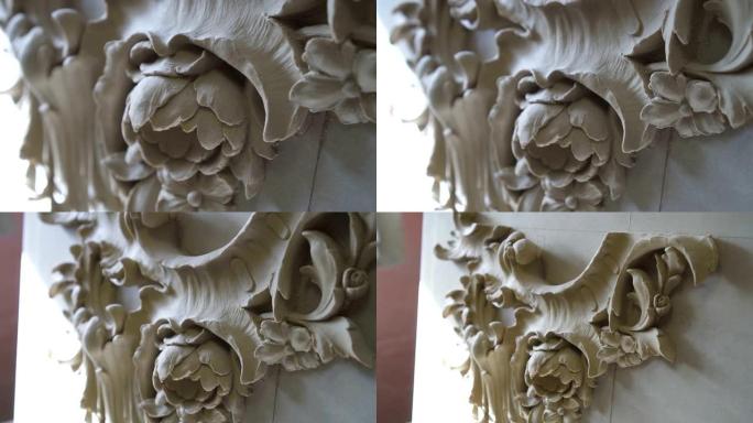 美丽的白色石膏花作为模制品的一部分
