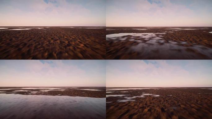 摄像机在潮湿的沙滩上向地平线快速移动