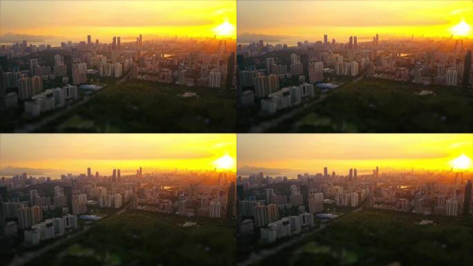 深圳日落太阳灯著名市政厅公园空中全景4k倾斜移位中国