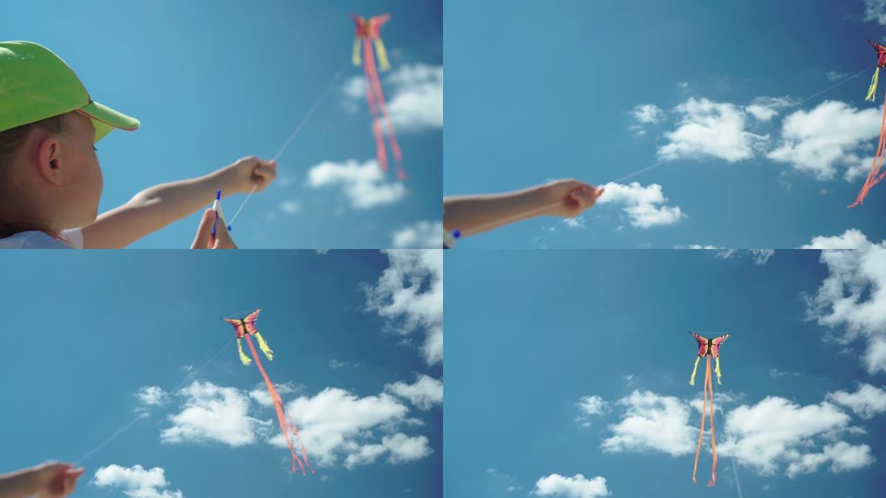 年轻女孩在晴朗的晴天玩风筝。完美的蓝天。假日童年和梦想概念。快乐女孩控制风筝