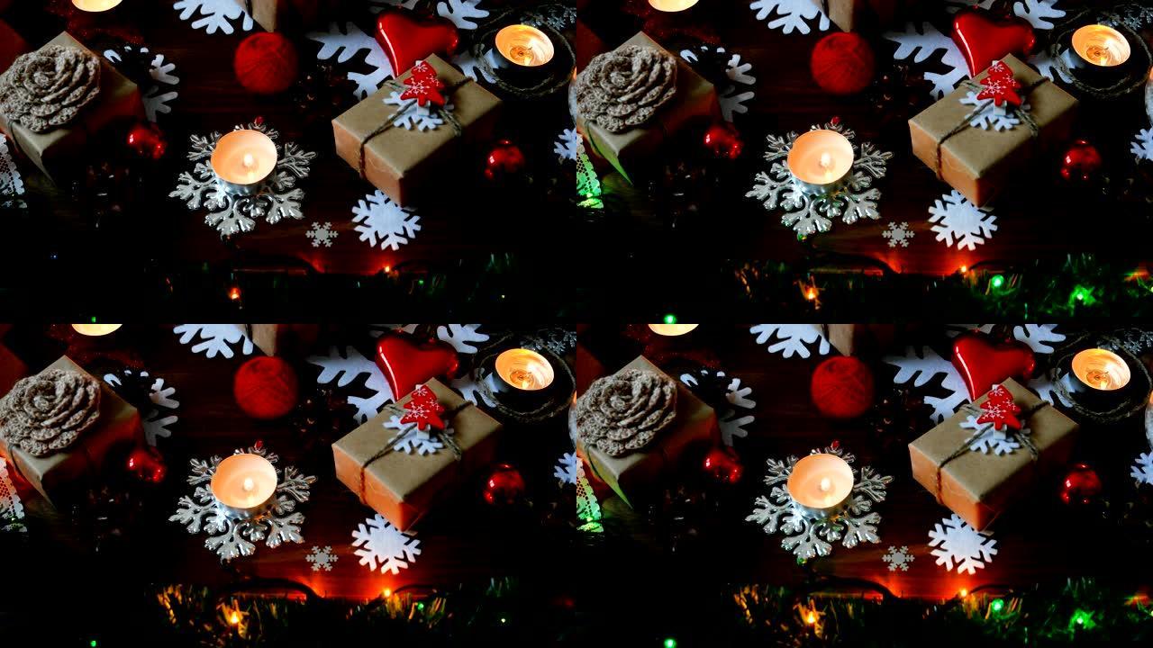 圣诞节和新年背景，包括礼物、灯泡、蜡烛和不同的装饰品。