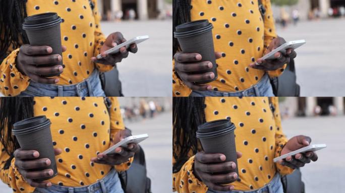 使用手机手持相机编织头发的千禧一代非洲女性肖像