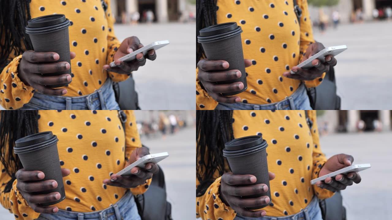 使用手机手持相机编织头发的千禧一代非洲女性肖像