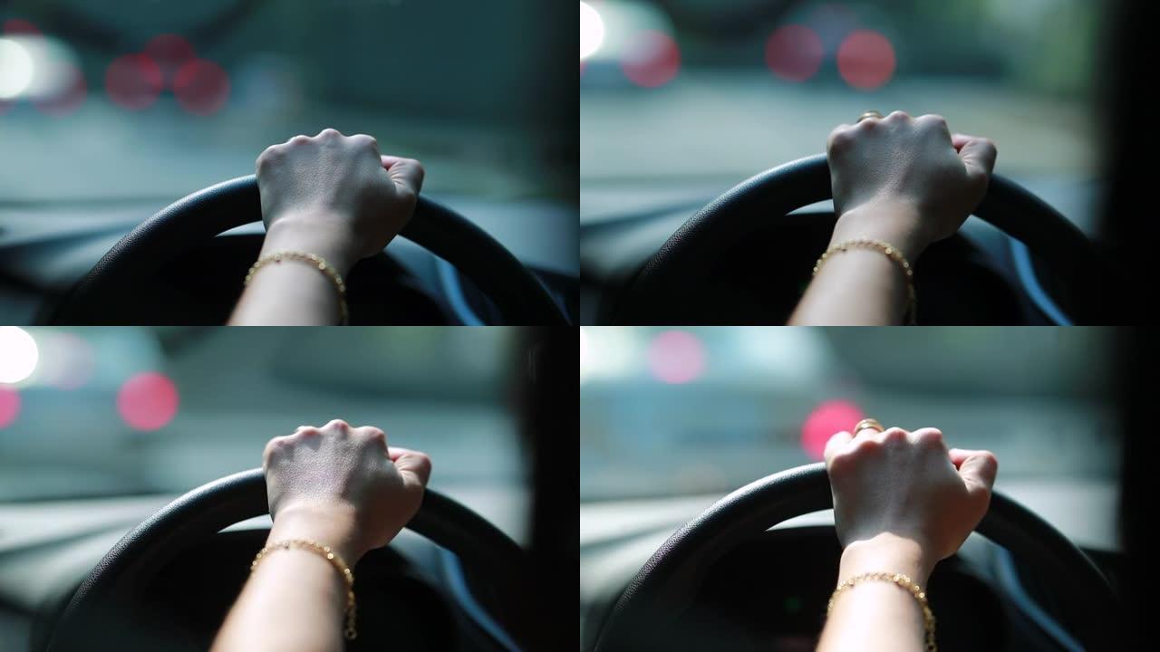 女人手握方向盘驾驶特写